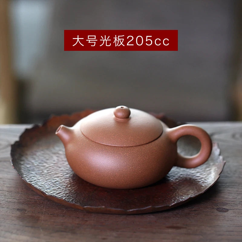 Yixing purple clay teapot pure manual Duan Ni Bian Xishi household tea making handle Xishi Teapot Tea Set raw material
