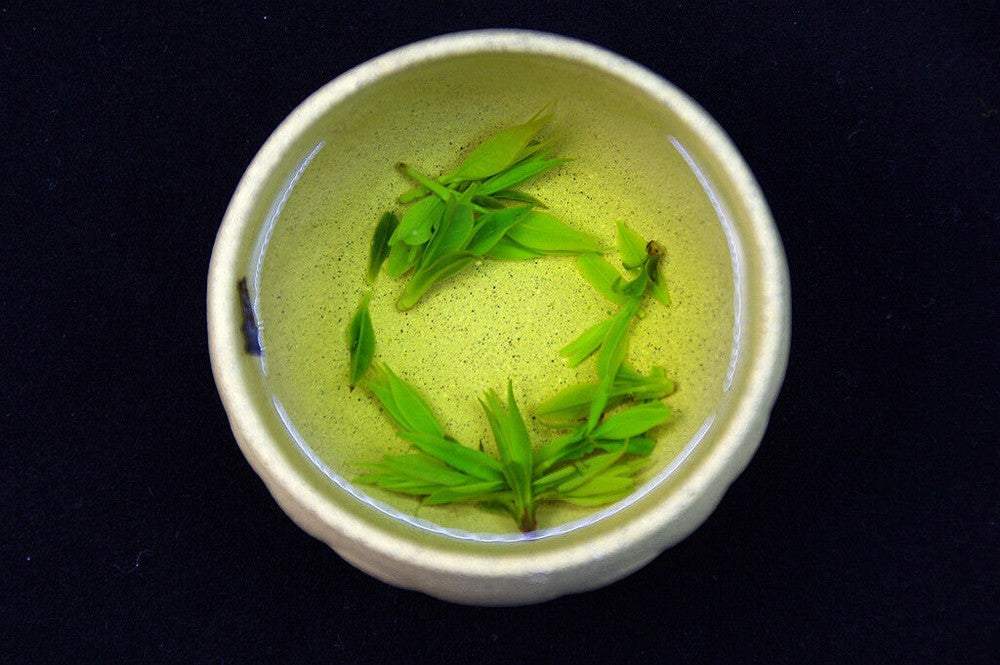 Natural Small Leaf Kuding Tea " Qing Shan Lu Shui " Bitter Tea China Herbal Tea