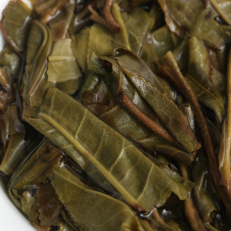 Xigui Desert Mountain Tea Cake Spring Tea 357g Seven Cakes Tea Yunnan Pu'er Tea