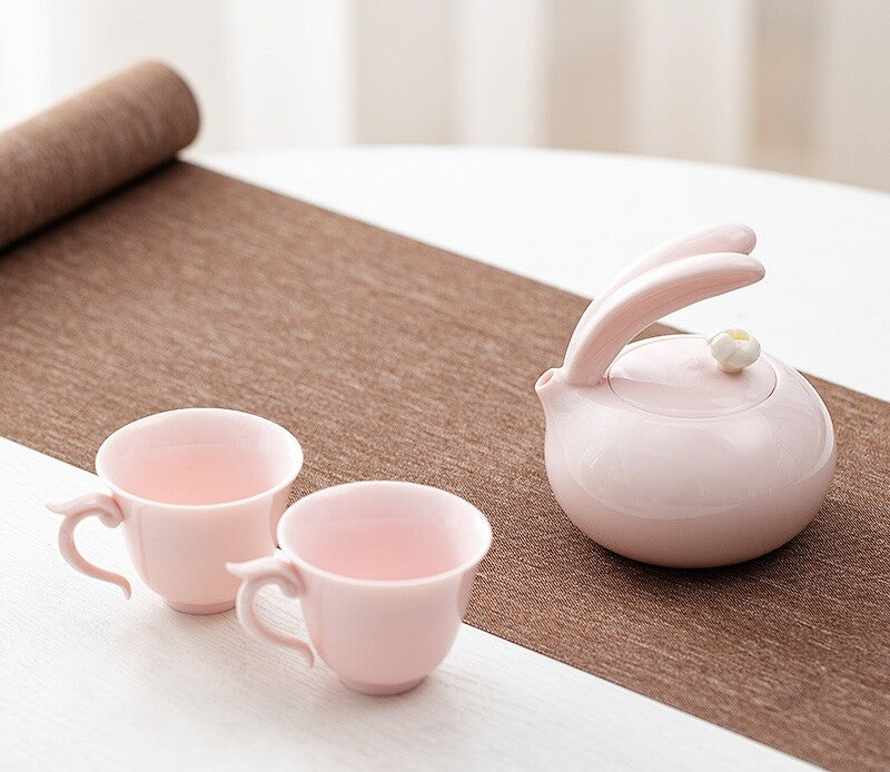 Porcelain Tea Set For Lady Pink Tea Pot Ball Shaped Infuser Hole Matching Teacup