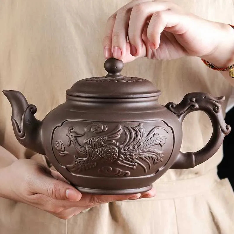 Teapots Large capacity purple clay teapot household Kung Fu cup Yixing Juni plum blossom teapot large teapot ceramic teapot y240701