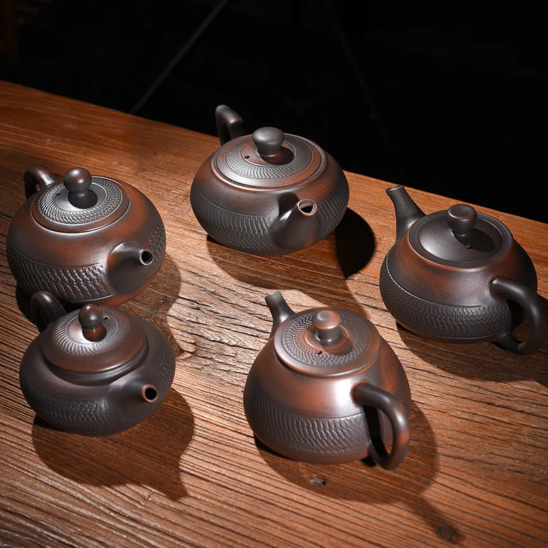 Jump knife Purple Pottery Teapot Ceramic Household   Pot Kung Fu Tea Set  Pure Handmade Teapot Teapot for Tea Puer Tea Kettle