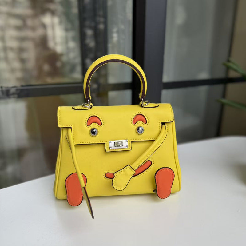 2026 new first-layer cowhide spoof smiley face small bag graffiti Kelly bag panda bag genuine leather portable messenger bag