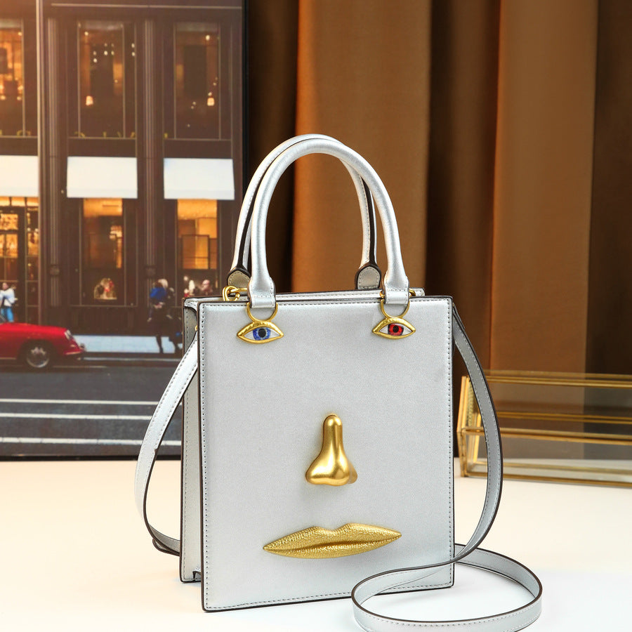 Artistic Face Sculpture Bag for Women 3D Metal Facial Features Top Handle Shoulder Crossbody Purse, Vintage Premium Handbag with Unique Sculptural Design