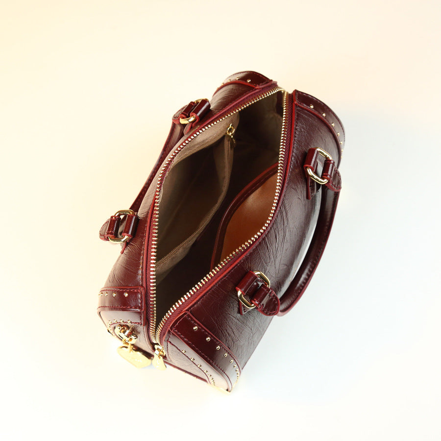 Studded Boston Pillow Bag for Women Vintage Commuter Top Handle Shoulder Crossbody Purse with Premium Hardware Accent