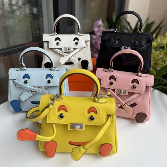 2026 new first-layer cowhide spoof smiley face small bag graffiti Kelly bag panda bag genuine leather portable messenger bag