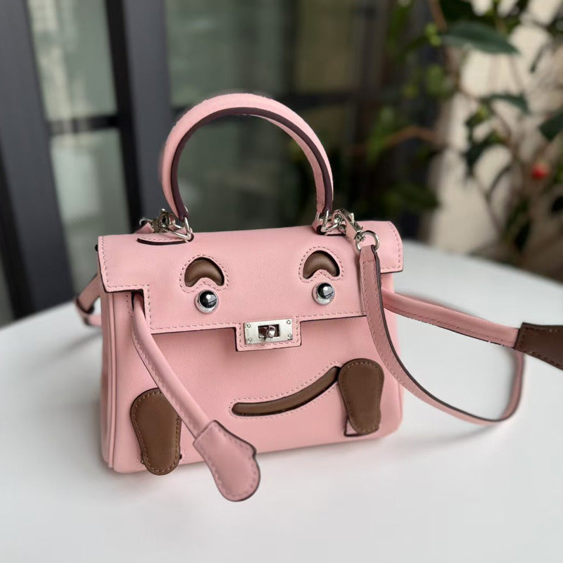 2026 new first-layer cowhide spoof smiley face small bag graffiti Kelly bag panda bag genuine leather portable messenger bag
