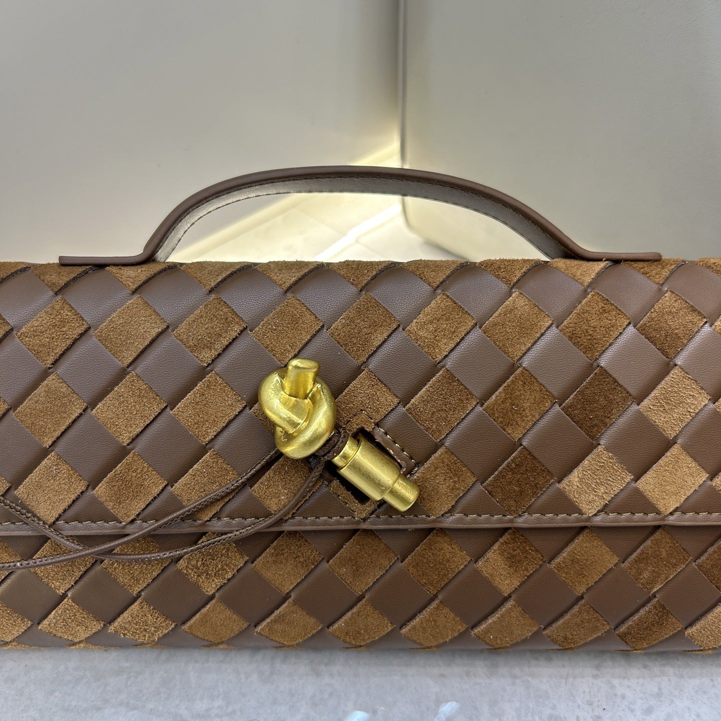 Matte leather spliced woven clutch, vintage metal latch evening bag, fashionable baguette bag for women