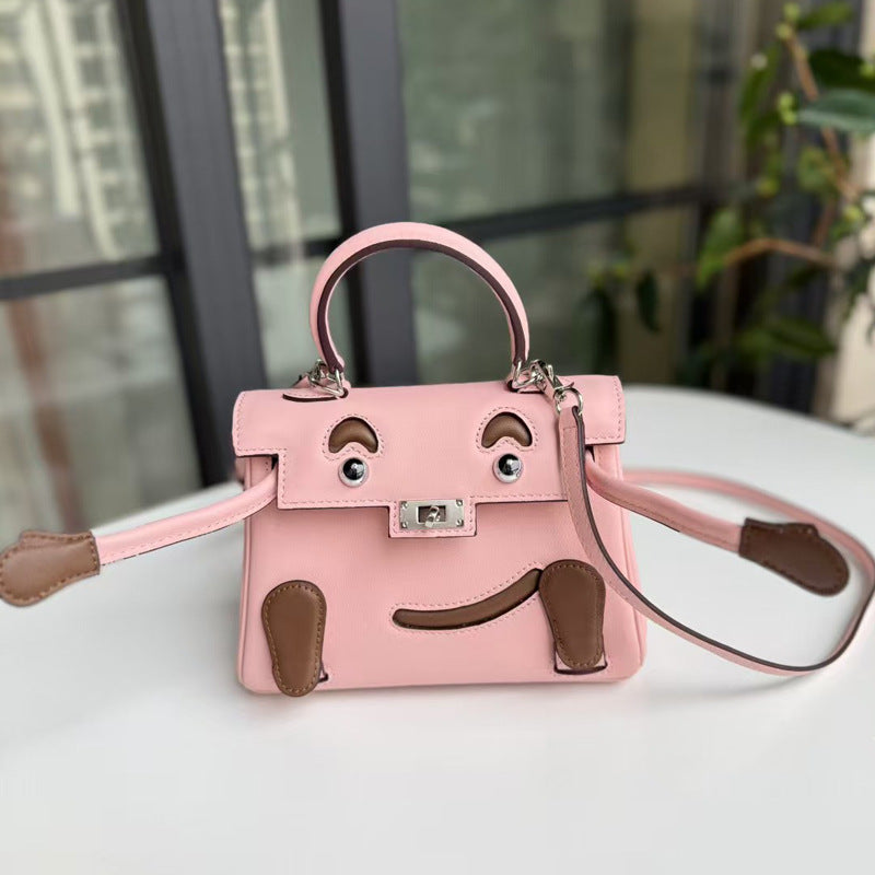 2026 new first-layer cowhide spoof smiley face small bag graffiti Kelly bag panda bag genuine leather portable messenger bag