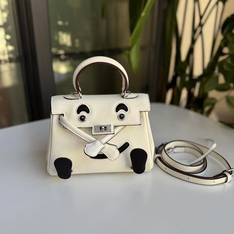 2026 new first-layer cowhide spoof smiley face small bag graffiti Kelly bag panda bag genuine leather portable messenger bag