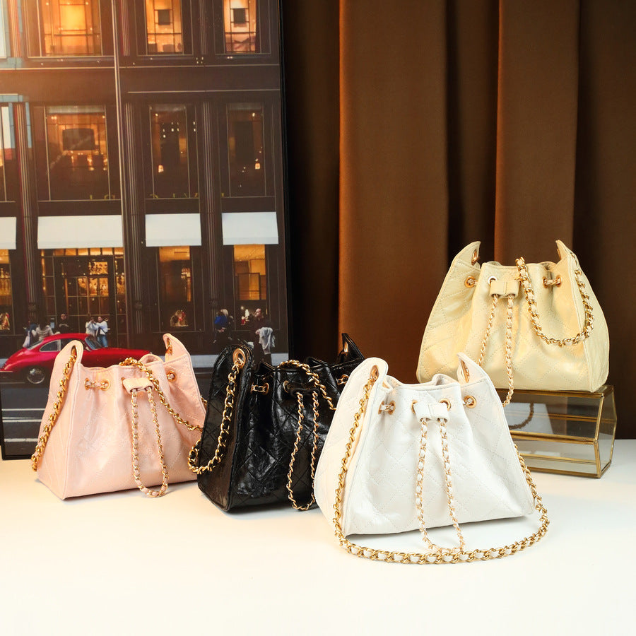 Quilted Drawstring Bucket Bag for Women Creamy Chain Shoulder Crossbody Handbag, Soft Versatile Purse with Sweet Spring Style