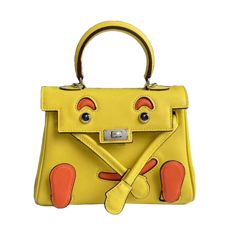 2026 new first-layer cowhide spoof smiley face small bag graffiti Kelly bag panda bag genuine leather portable messenger bag