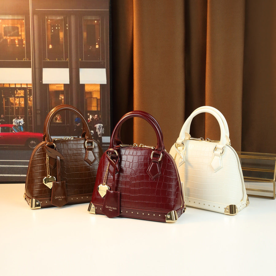 Chic French Style Croc-Effect Shell Bag for Women, A Light Luxury Structured Top-Handle Handbag with Metal Stud Details & Heart Charm, Versatile Shoulder Crossbody Purse