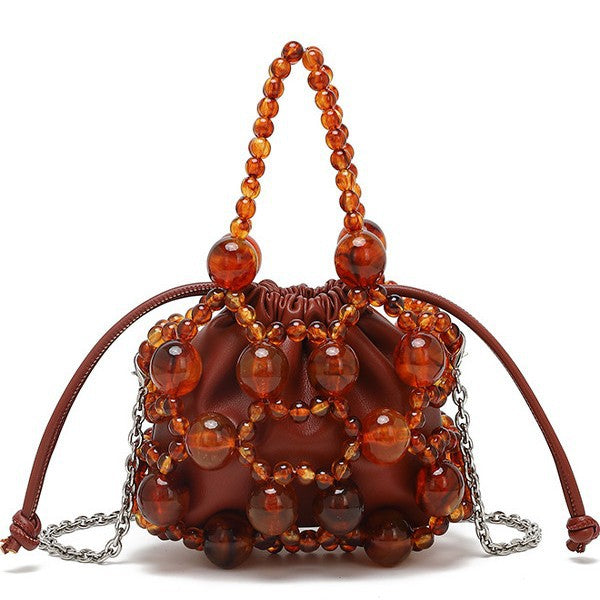 Cross-border new niche design exquisite hollow metal beaded woven bag 2025 new sense portable oblique span bag
