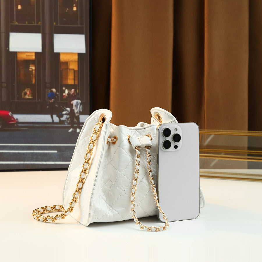 Quilted Drawstring Bucket Bag for Women Creamy Chain Shoulder Crossbody Handbag, Soft Versatile Purse with Sweet Spring Style