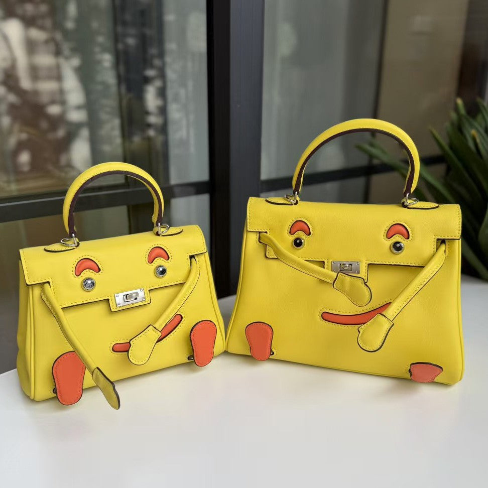 2026 new first-layer cowhide spoof smiley face small bag graffiti Kelly bag panda bag genuine leather portable messenger bag