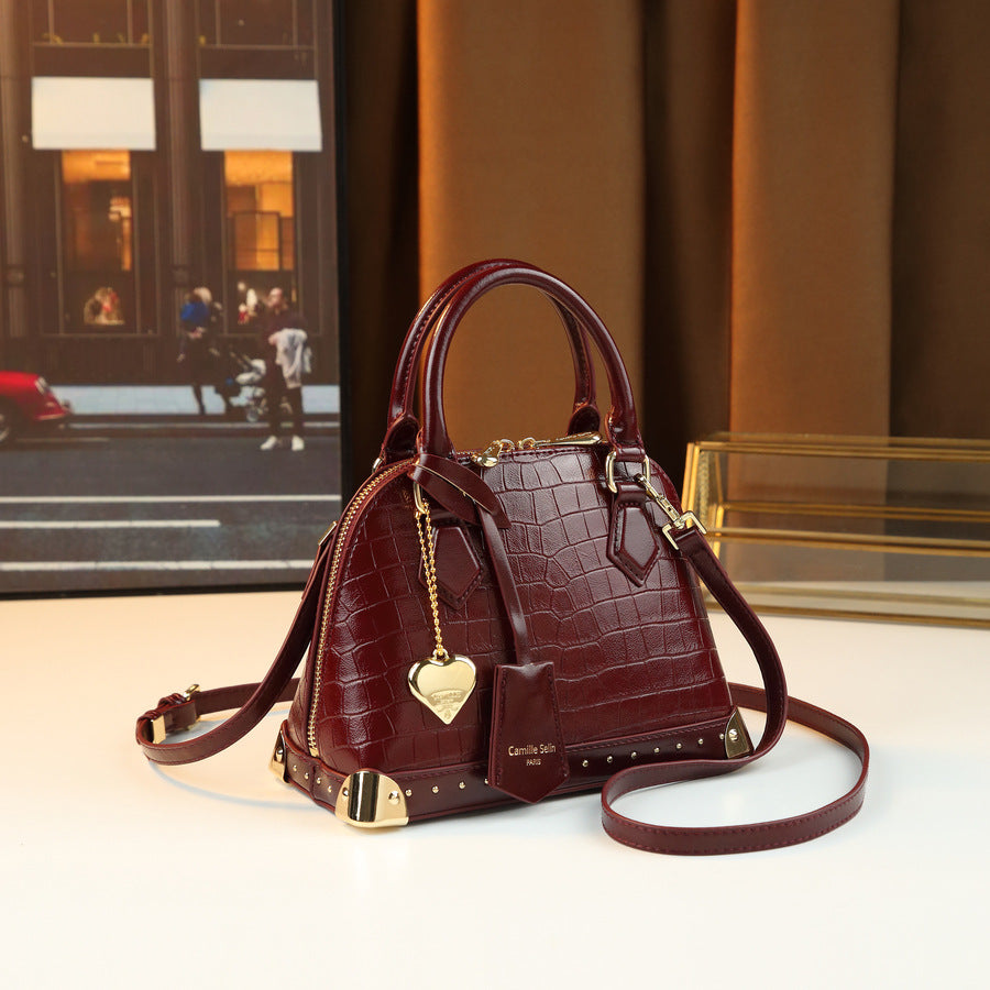Chic French Style Croc-Effect Shell Bag for Women, A Light Luxury Structured Top-Handle Handbag with Metal Stud Details & Heart Charm, Versatile Shoulder Crossbody Purse