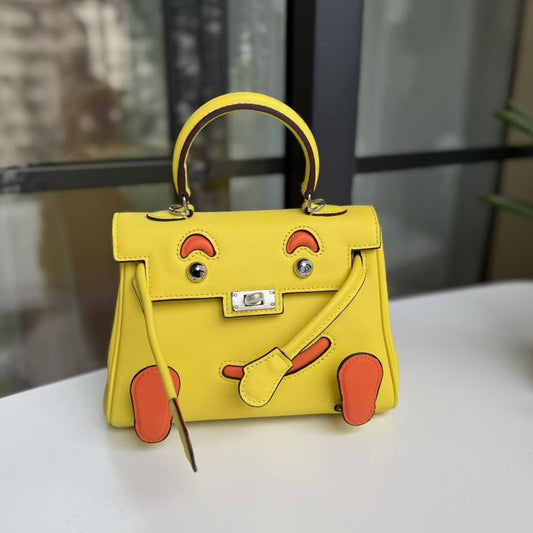 2026 new first-layer cowhide spoof smiley face small bag graffiti Kelly bag panda bag genuine leather portable messenger bag
