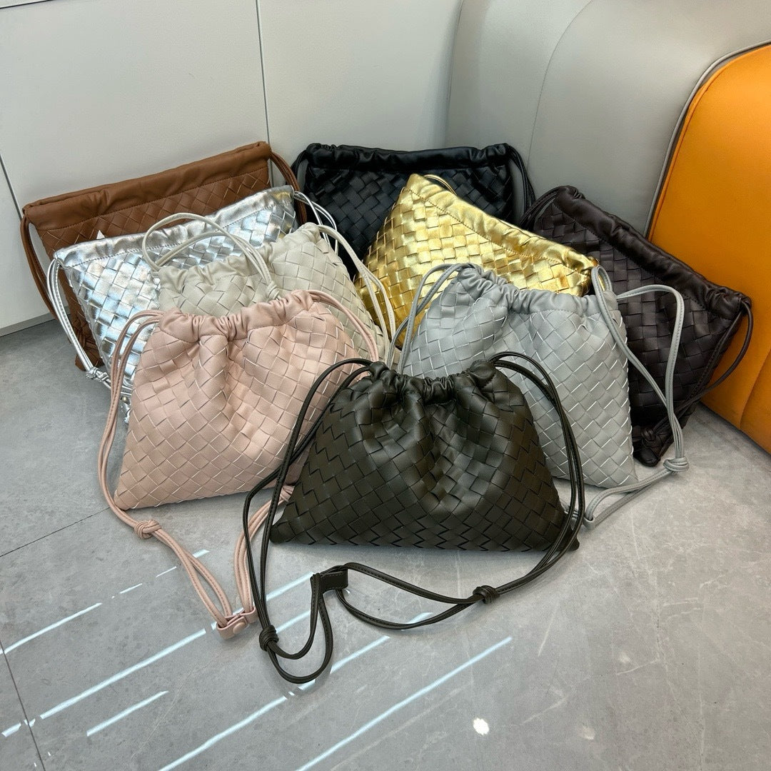 First layer cowhide leather woven bag, clutch bag, drawstring lucky bag, large capacity underarm shoulder bag, bag for women