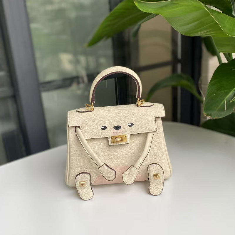 2026 new first-layer cowhide spoof smiley face small bag graffiti Kelly bag panda bag genuine leather portable messenger bag