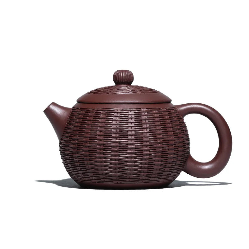 Yixing purple clay teapot is a pure handmade teapot with inner wall decorated with Kung Fu Tea