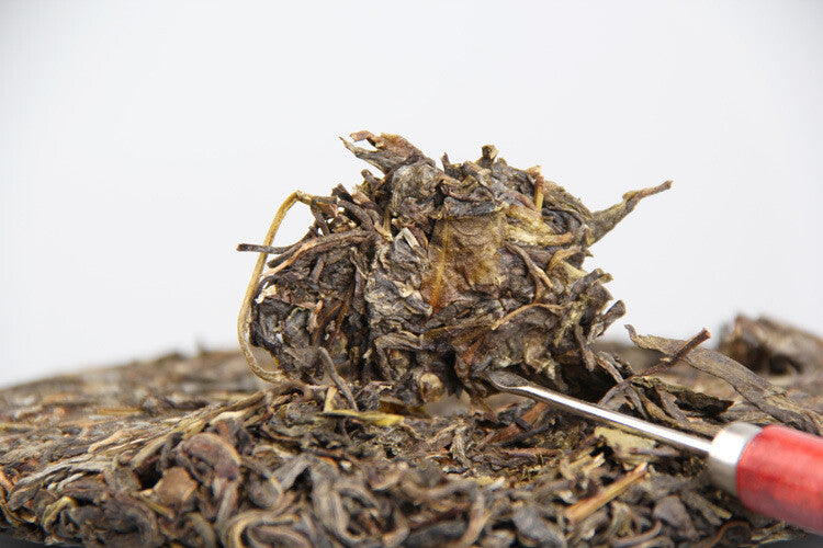 357g/12.59oz Ming Qian Ancient Spring Tea Pu'er Raw Tea Seven Seed Cake Tea
