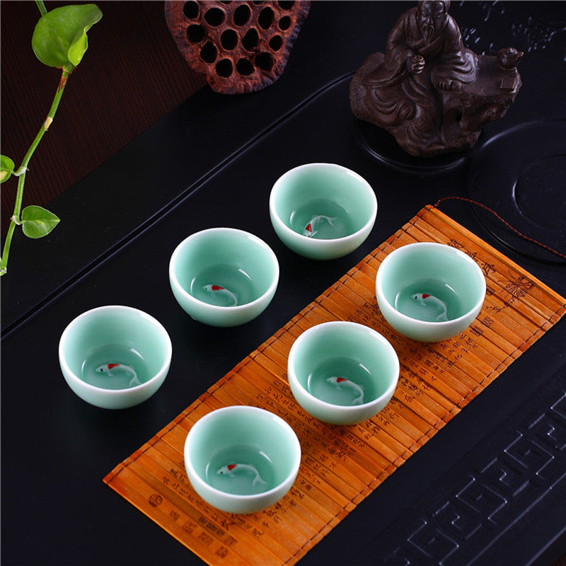 Porcelain tea cup fish relief cup of tea Chinese tea cup ceramic cups creative