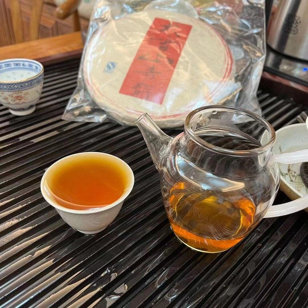 357g Yunnan Old Puerh Tea 2009 Daxueshan Sheng Pu-erh Tea Cake Aged Pu'er Tea
