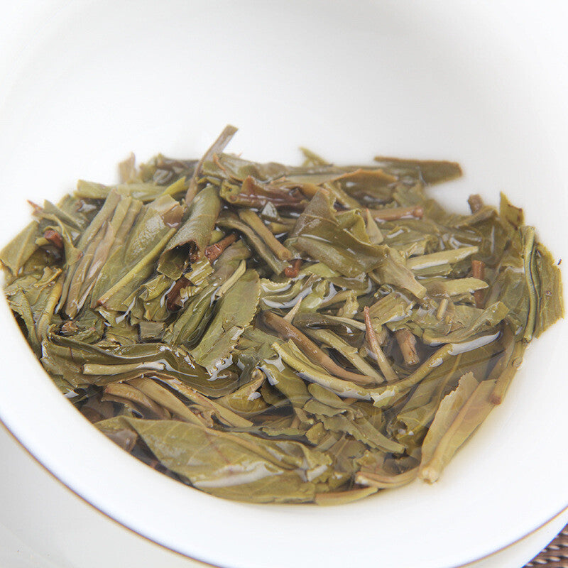 100g/cake Yunnan Pu'er raw tea cake Xigui wilderness tea Icelandic tea