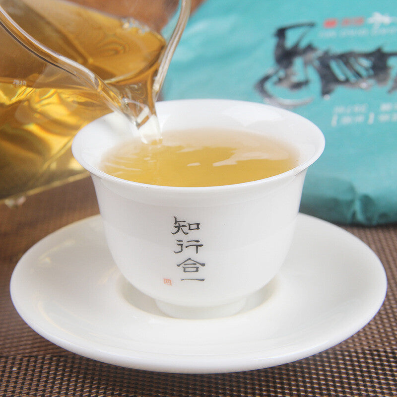 Icelandic raw tea cake spring tea pure sweet Mengku Pu'er seven seed cake tea