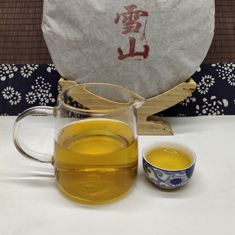 Raw Pu'er tea cake yunnan Sheng Puerh Tea Snow Mountain Old Tree Puer Tea 357g