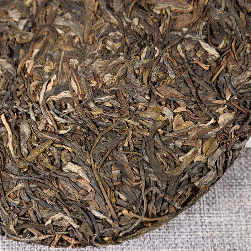 Yiwu Fenghuang Wo Seven Seeds Cake Spring Tea 357 Organic Green Tea Tea Cake