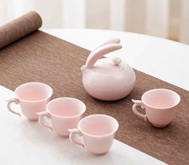 Porcelain Tea Set For Lady Pink Tea Pot Ball Shaped Infuser Hole Matching Teacup