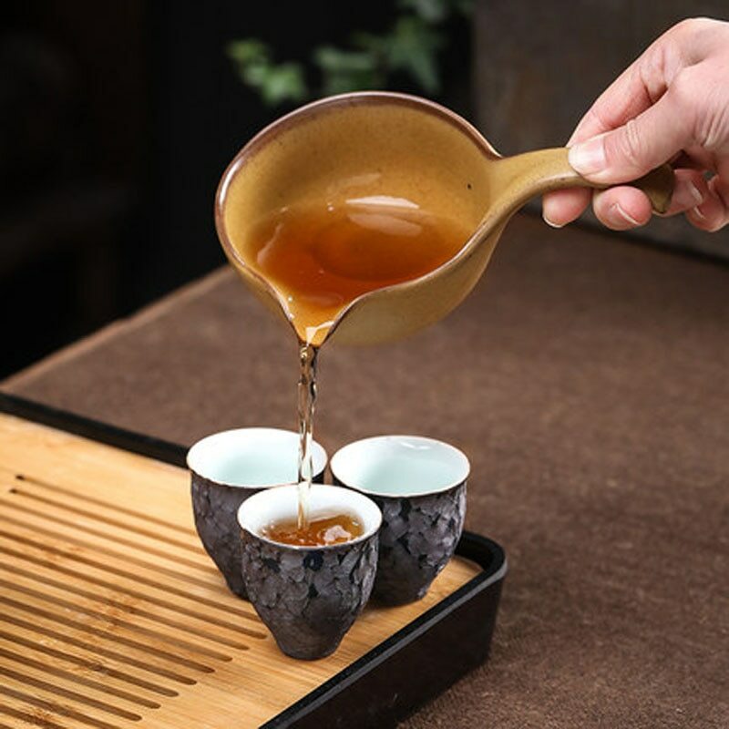 Pottery Automatic Lazy Stone Grinding Tea Set Rotating Teapot Kung Fu Tea Set
