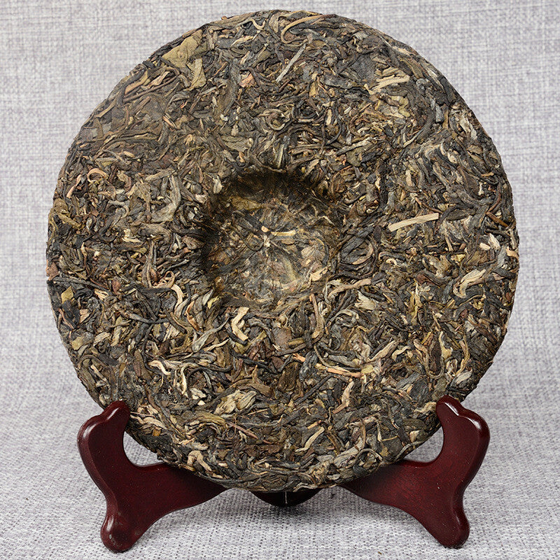 Pu'er Tea 2014 Spring Tea Ancient Tree Tea Yunnan Seven Seed Cake Tea 357g
