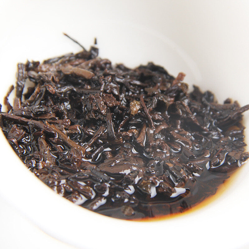 Long Yuan No. Pu'er Ripe Tea Cake Ancient Tree Yunnan Seven Seeds Cake 380g/cake