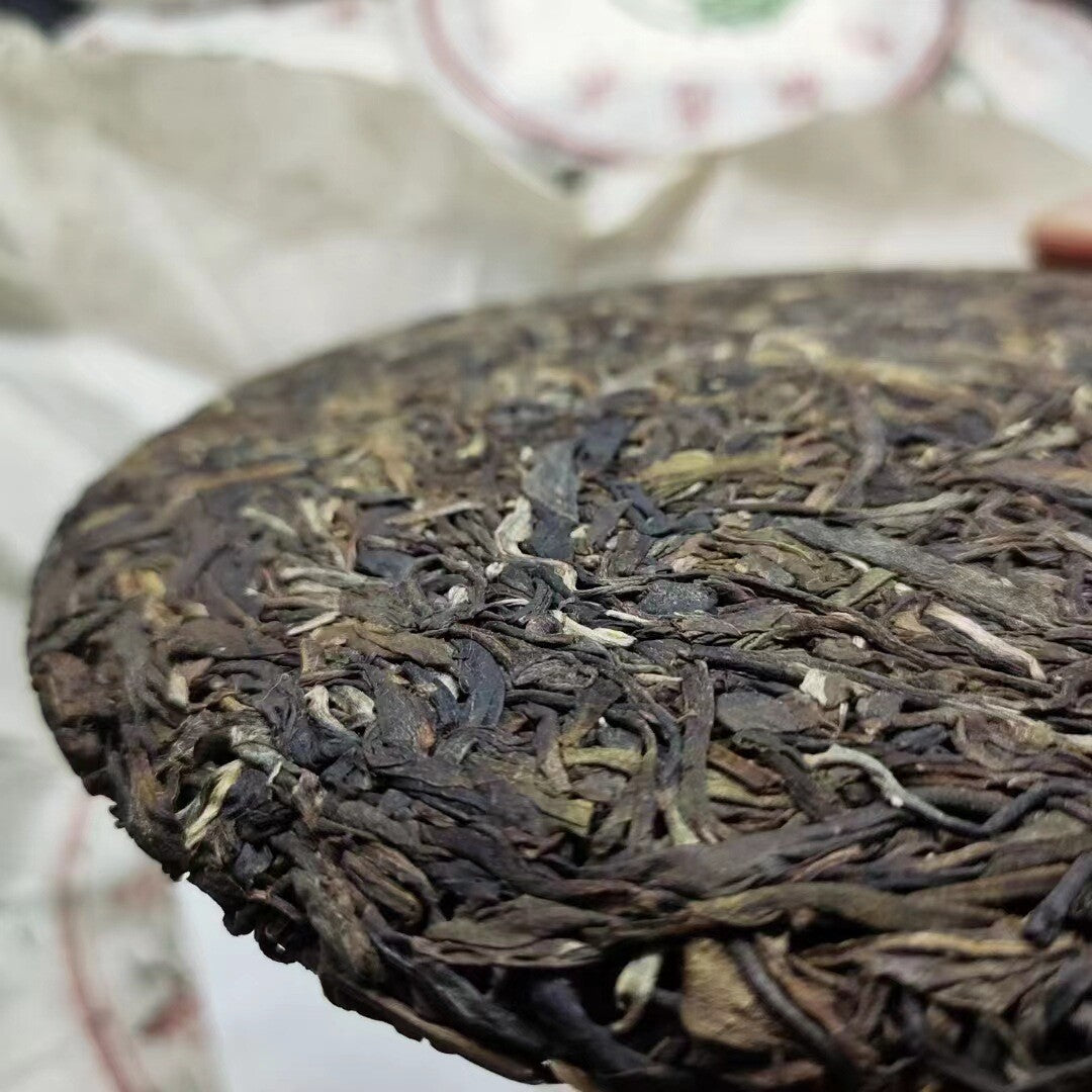 357g Yunnan Tea Seven Seeds Cake Cabbage Ancient Tree Pu'er Tea Raw Tea Cake Tea